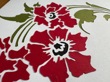 Load image into Gallery viewer, alternate angle of white card with red flowers and green leaves made from cut-paper