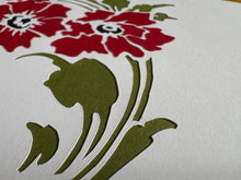 Load image into Gallery viewer, alternate angle of white card with red flowers and green leaves made from cut-paper